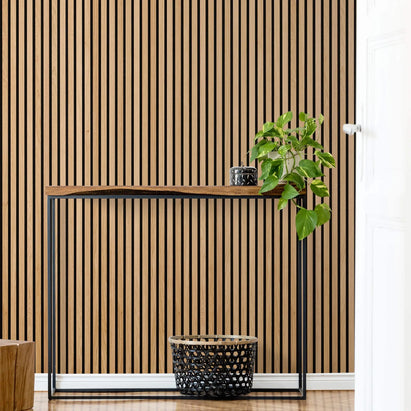 Natural oak fluted wood wall panel in a modern hallway