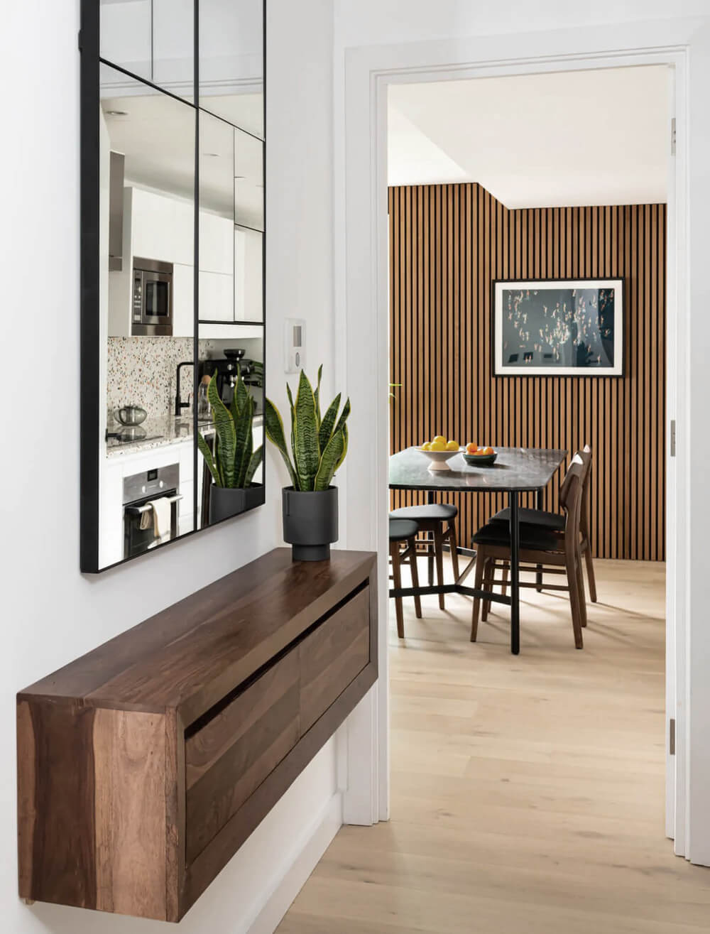 Wall panelling installation in modern kitchen 